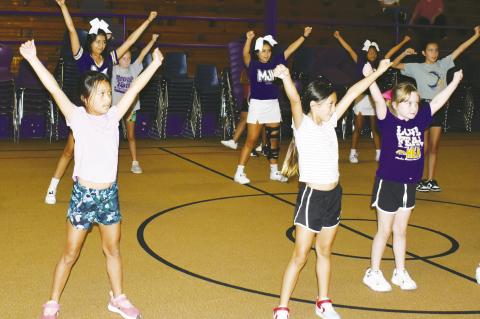 Preparing to cheer the team on to victory