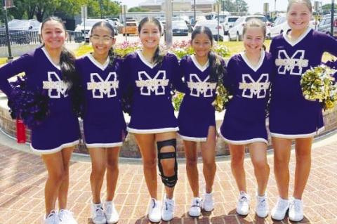 Meadow Junior High, Varsity cheerleaders attend NCA Camp