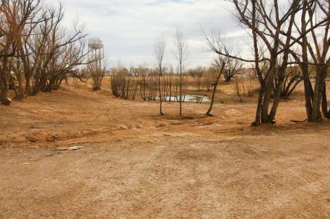 Parks and Recreation, Street employees clean up tension basin