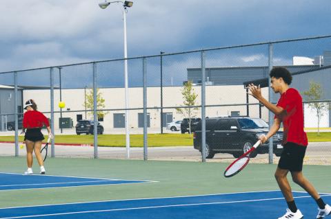 Mostly cloudy with a chance of tennis balls